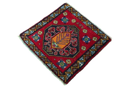 Corner detail of 2000s Shiraz rug showing border pattern and Wool pile