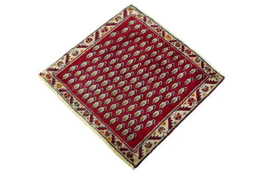 Corner detail of 2000s Shiraz rug showing border pattern and Wool pile