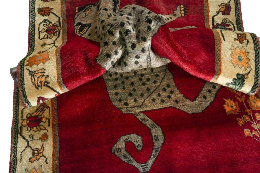 Corner detail of 2000s Shiraz rug showing border pattern and Wool pile