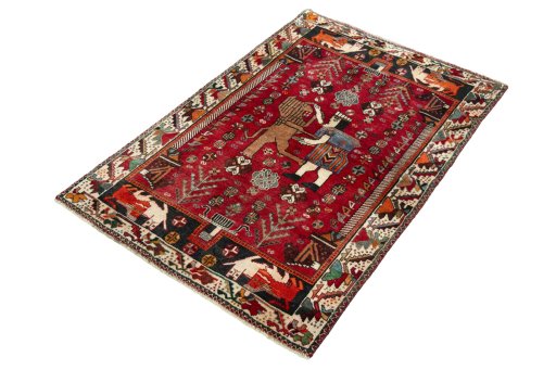 Corner detail of 2000s Shiraz rug showing border pattern and Wool pile