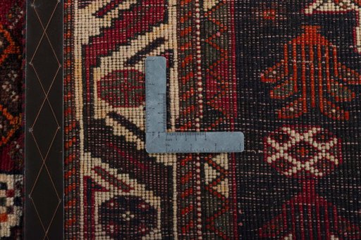 Surface texture of 2000s Shiraz rug with natural Wool and intricate pattern