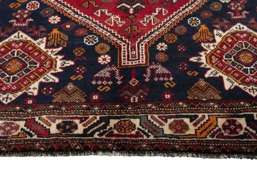Close-up detail of 2000s Shiraz rug from Iran / Persia showing Wool weave