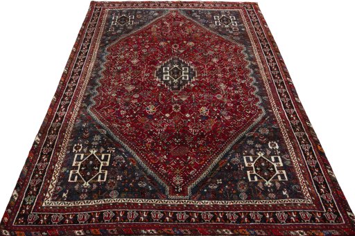 Surface texture of 1970s Shiraz rug with natural Wool and intricate pattern