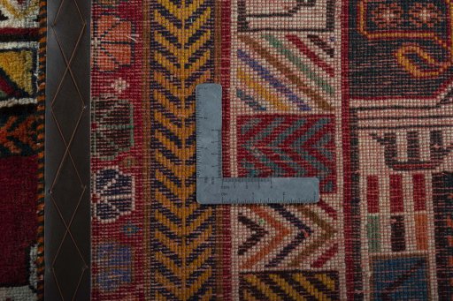Surface texture of 2000s Shiraz rug with natural Wool and intricate pattern