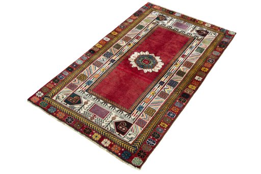 Corner detail of 2000s Shiraz rug showing border pattern and Wool pile
