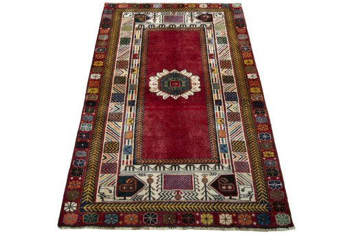 Surface texture of 2000s Shiraz rug with natural Wool and intricate pattern