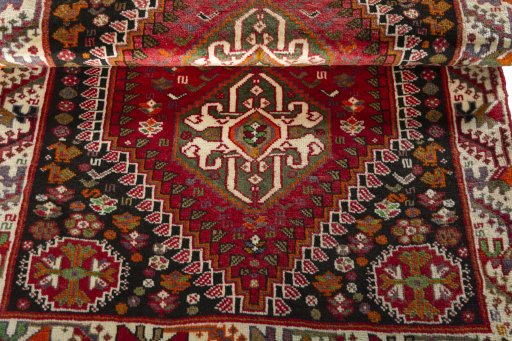 Full view of 2000s Shiraz rug from Iran / Persia, 150 × 104 cm in Red tones