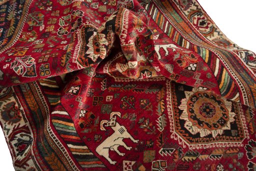 Corner detail of 2000s Shiraz rug showing border pattern and Wool pile