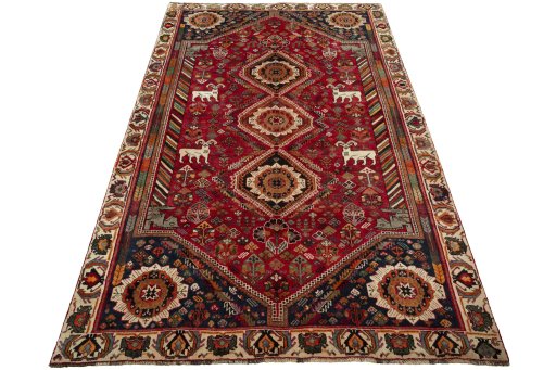 Surface texture of 2000s Shiraz rug with natural Wool and intricate pattern