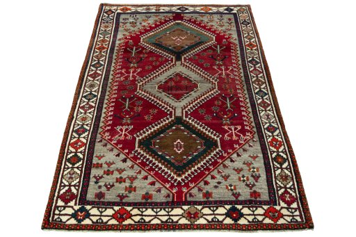 Surface texture of 2000s Shiraz rug with natural Wool and intricate pattern