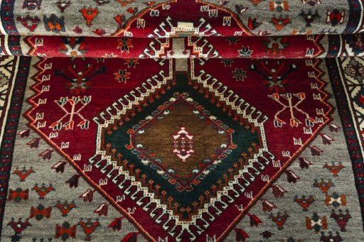 Full view of 2000s Shiraz rug from Iran / Persia, 225 × 140 cm in Red tones