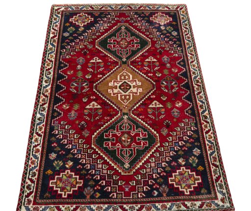 Surface texture of 2000s Shiraz rug with natural Wool and intricate pattern