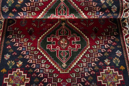 Full view of 2000s Shiraz rug from Iran / Persia, 175 × 110 cm in Red tones