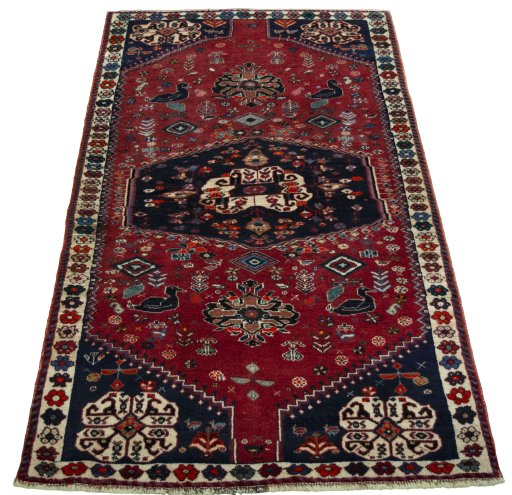 Surface texture of 2000s Shiraz rug with natural Wool and intricate pattern
