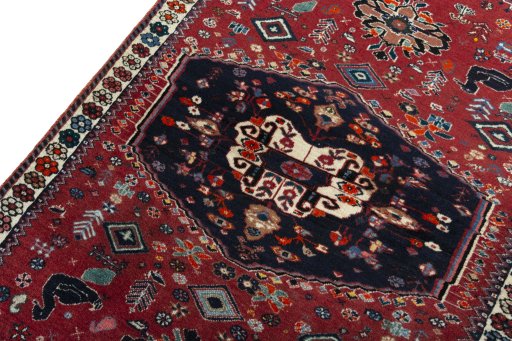 Backside of handmade 2000s Shiraz rug showing knot structure and weave density