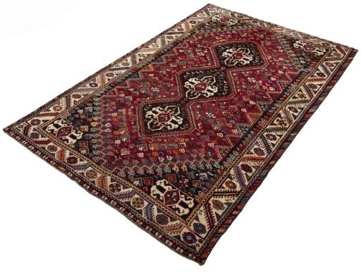 Corner detail of 2000s Shiraz rug showing border pattern and Wool pile
