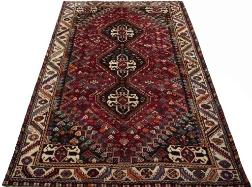 Surface texture of 2000s Shiraz rug with natural Wool and intricate pattern