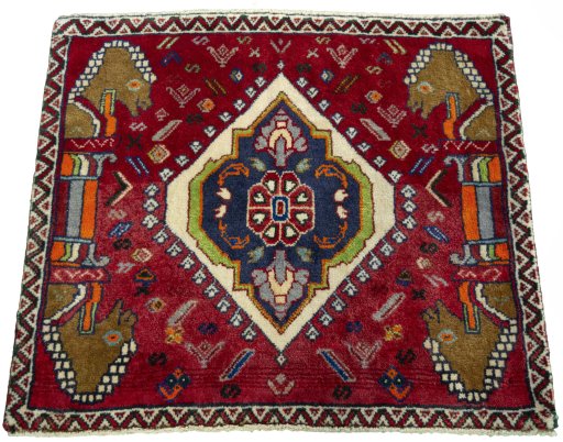 Surface texture of 2000s Shiraz rug with natural Wool and intricate pattern