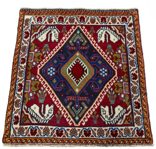 Surface texture of 2000s Shiraz rug with natural Wool and intricate pattern