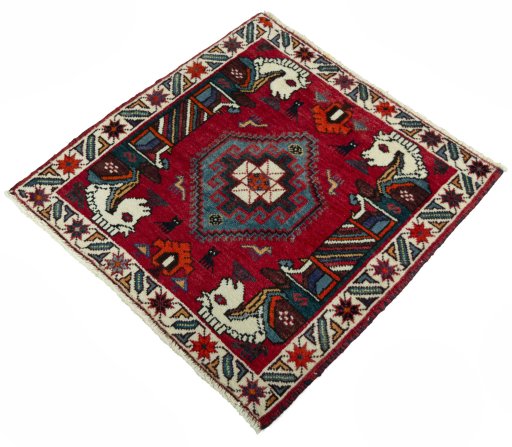 Corner detail of 2000s Shiraz rug showing border pattern and Wool pile