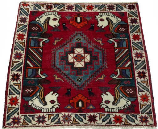 Surface texture of 2000s Shiraz rug with natural Wool and intricate pattern