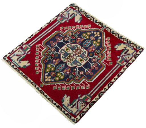 Corner detail of 2000s Shiraz rug showing border pattern and Wool pile
