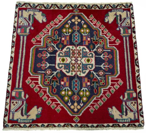 Surface texture of 2000s Shiraz rug with natural Wool and intricate pattern