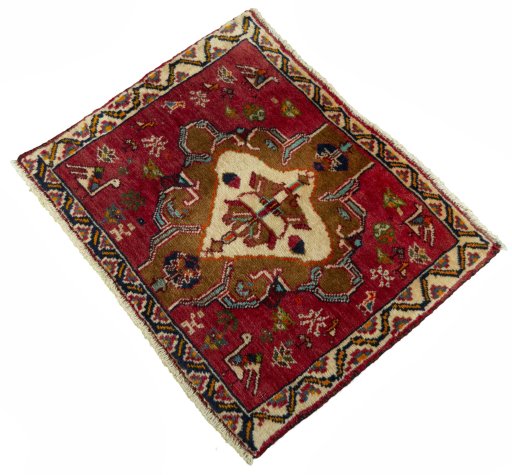 Corner detail of 2000s Shiraz rug showing border pattern and Wool pile