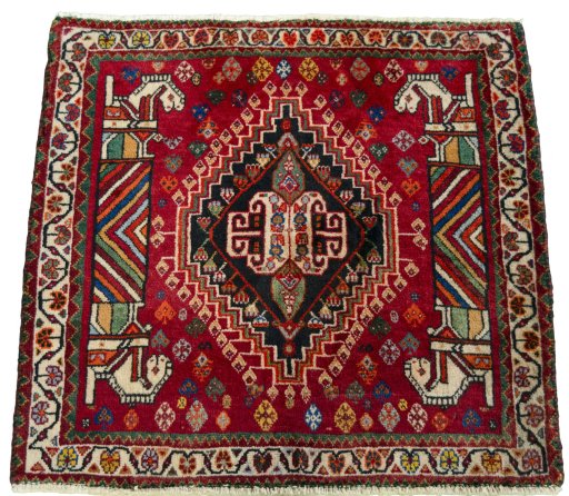 Surface texture of 2000s Shiraz rug with natural Wool and intricate pattern