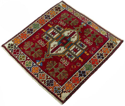 Corner detail of 2000s Shiraz rug showing border pattern and Wool pile