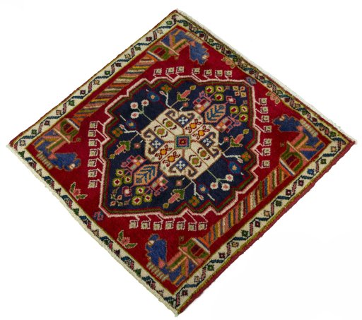 Corner detail of 2000s Shiraz rug showing border pattern and Wool pile