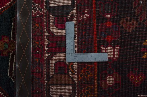 Close-up detail of 2000s Shiraz rug from Iran / Persia showing Wool weave
