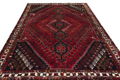 Surface texture of 2000s Shiraz rug with natural Wool and intricate pattern