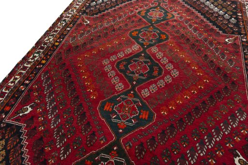 Backside of handmade 2000s Shiraz rug showing knot structure and weave density
