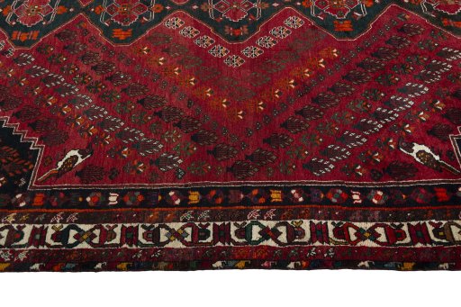 Close-up detail of 2000s Shiraz rug from Iran / Persia showing Wool weave