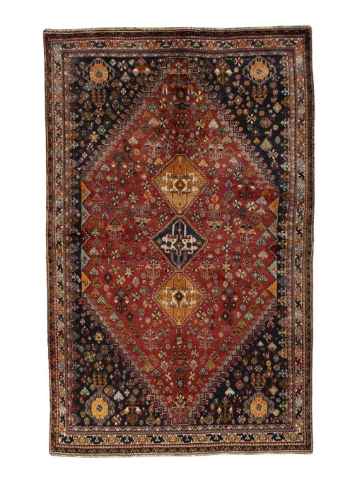 Full view of 2000s Shiraz rug from Iran / Persia, 278 × 176 cm in Red tones