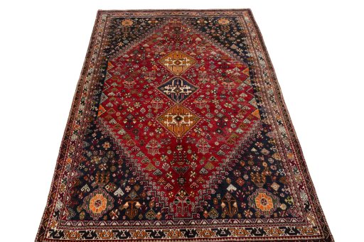 Surface texture of 2000s Shiraz rug with natural Wool and intricate pattern