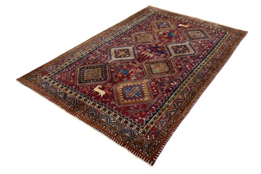 Corner detail of 2000s Shiraz rug showing border pattern and Wool pile