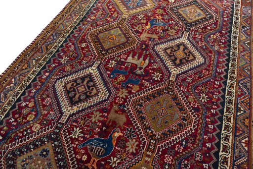 Backside of handmade 2000s Shiraz rug showing knot structure and weave density