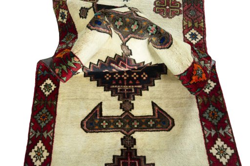 Corner detail of 2000s Shiraz rug showing border pattern and Wool pile