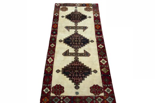 Surface texture of 2000s Shiraz rug with natural Wool and intricate pattern
