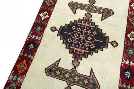 Backside of handmade 2000s Shiraz rug showing knot structure and weave density