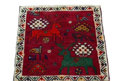 Surface texture of 2000s Shiraz rug with natural Wool and intricate pattern