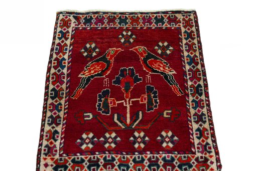 Surface texture of 2000s Shiraz rug with natural Wool and intricate pattern