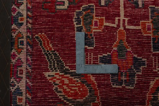 Backside of handmade 2000s Shiraz rug showing knot structure and weave density
