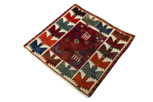Corner detail of 2000s Shiraz rug showing border pattern and Wool pile