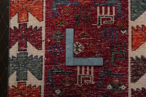 Backside of handmade 2000s Shiraz rug showing knot structure and weave density