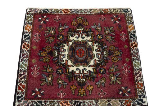 Surface texture of 2000s Shiraz rug with natural Wool and intricate pattern