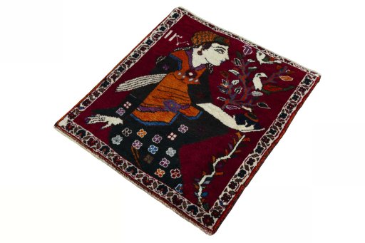 Corner detail of 2000s Shiraz rug showing border pattern and Wool pile