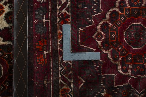 Surface texture of 2000s Shiraz rug with natural Wool and intricate pattern
